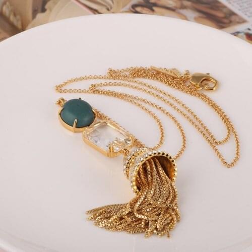 Long necklace with tassels inlaid with natural stone geometric crystals