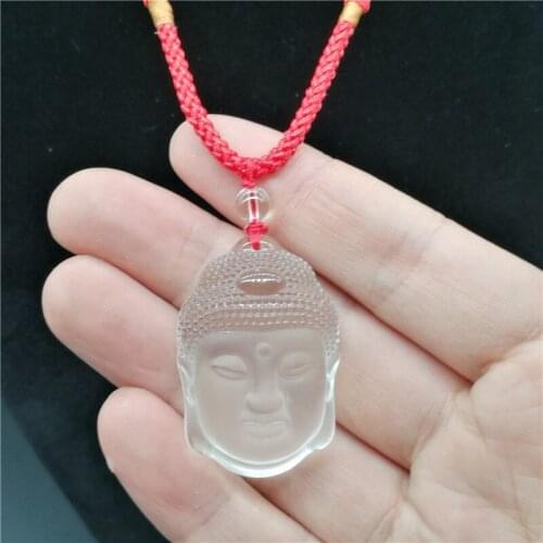 2018 New natural crystal white crystal Sakyamuni pendant genuine Buddha head hanging fall safe and secure pendant