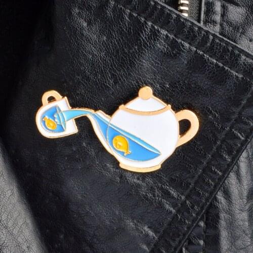 Cute vintage style teapot and teacup brooch Yellow fish Pour out from the teapot Fashion badge Perfect gift Clothing accessories