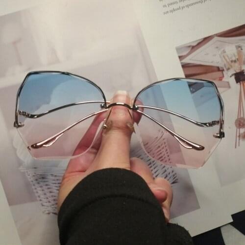 MGSEVZAQ Womens Sunglasses