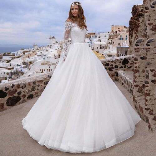 Gorgeous A-Line Tulle Wedding Gowns 2021 Lace Appliques High Quality Boat Neck Court Train Long Sleeve Bridal Dress