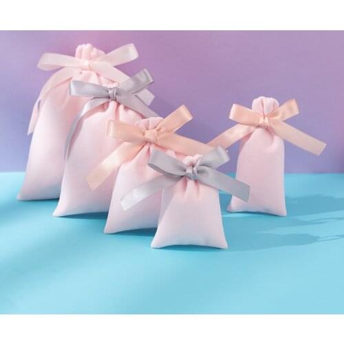 100pcs Small Velvet Bag Jewelry Gift Packaging 7X9cm Wedding Cosmetic Pouches Pink Flannel With Ribbon Bow Custom Logo Print