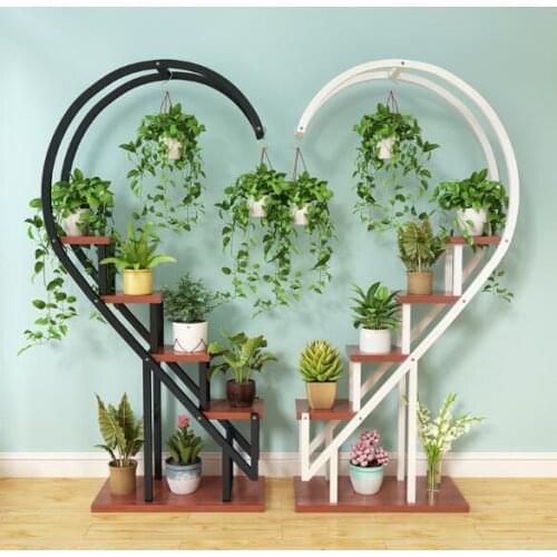 The living room household use pattern rack multilayer indoor special price balcony iron work circular buy content rack adornment