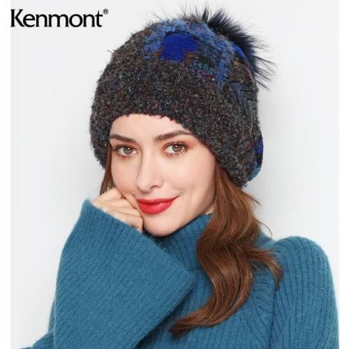 Heat and antibacterial wool ball Knitted Hat Winter forehead windproof cap womens wool hat outdoor ski pile cap 9425