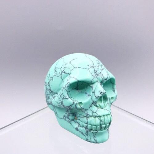 Natural turquoise quartz crystal skull aura