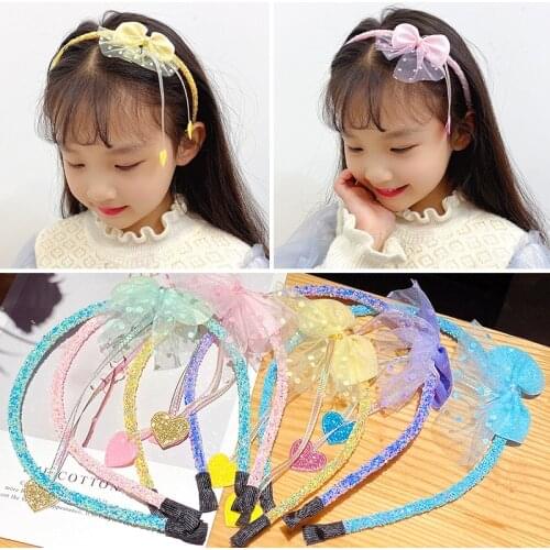 The little girl is beautiful and loving with fringe lace bow and a hair band to make your baby more beautiful and moving every