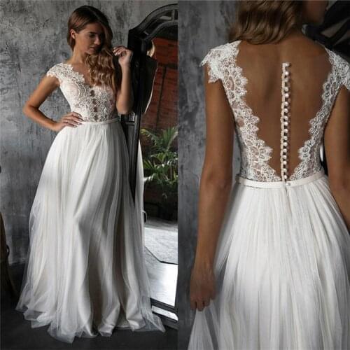 2021 Beach Wedding Dresses Lace Applique Cap Sleeves Sexy Illusion Covered Buttons Tulle Floor Length Wedding Gown Vestido de no