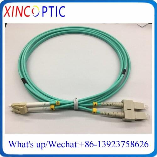 SC-LC OM3 DX 5M Fiber Patch Cord,SC/UPC-LC/UPC MM(OM3-150),DX,3.0mm,1/2/3/5M,Aqua LSZH Jacket,Fiber Optical Patch Cord Connector