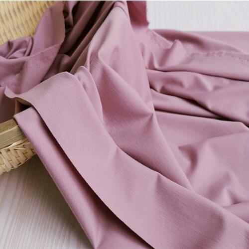 New and beautiful dark pink Tencel Roman ice silk stretch nylon cotton knitted fabric skirt pants T-shirt fabric