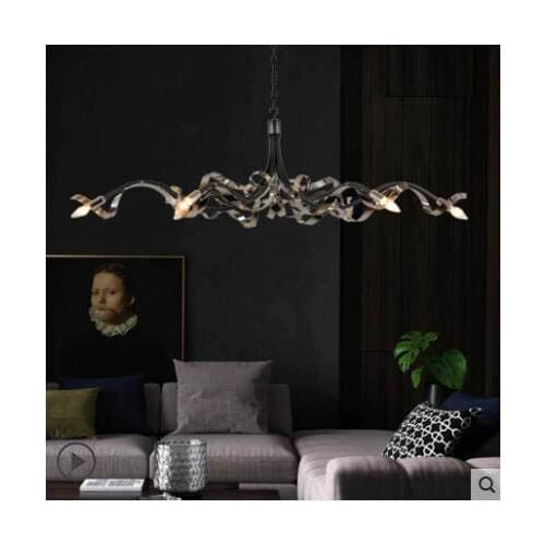 Light luxury postmodern restaurant chandelier creative stainless steel designer model room lamps simple bar decoration chandelie