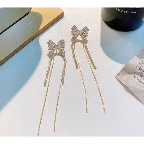 U-Magical Exaggerated Shining Rhinestone Bowknot Long Tassel Dangle Earring for Women Luxury Metal Earring Jewelry Pendientes