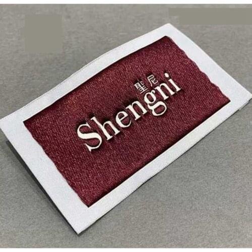 ZeQi 1000pcs custom logo label embroidered label for clothing main label silk screen labels wood shuttle machin