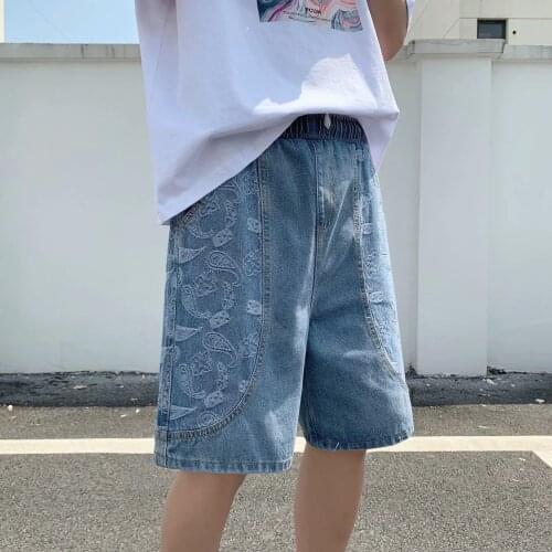 Casual denim shorts mens summer thin section trend tide brand new loose elastic waist five-point pants cashew flower pants