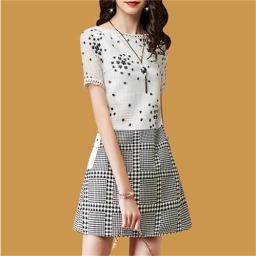 Dress female summer New fashion lattice stitching round neck waist was thin short-sleeved A word Dress women