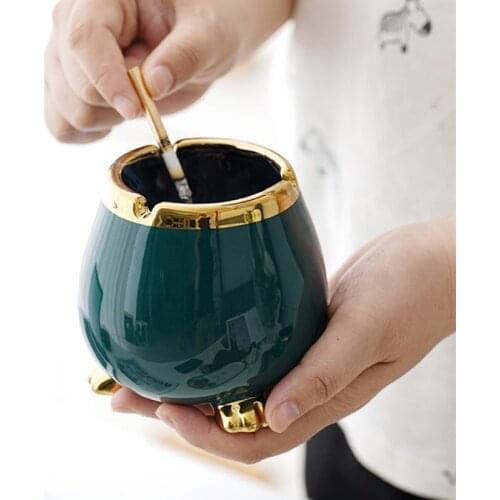 Ceramic ashtray Home living room Creative cat claw Anti-fly ash tea table decoration ornaments Trace gold craft Craft ornaments