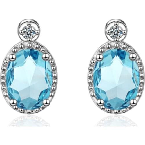 Temperament Korean personality simple and versatile small fresh artificial blue crystal silver plated earrings WE006