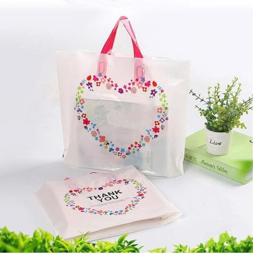 50pcs Lover flower pattern plastic clothing carry bag thicken gift books packing bags with handle