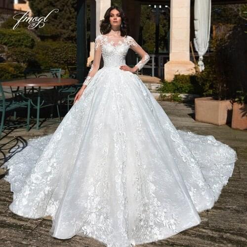 Fmogl Luxury Long Sleeve Lace Ball Gown Wedding Dresses 2021 Sexy Backless Appliques Beaded Chapel Train Princess Bridal Gowns
