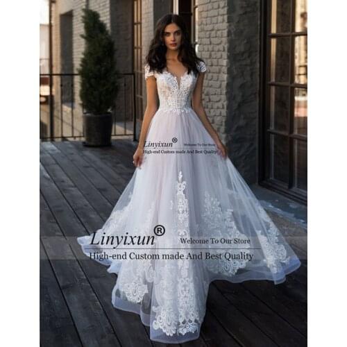 New Arrival V-Neck Cap Sleeve Beads Appliques Lace A Line Wedding Dresses 2021 Tulle Boho Bridal Gown Vestido De Noiva