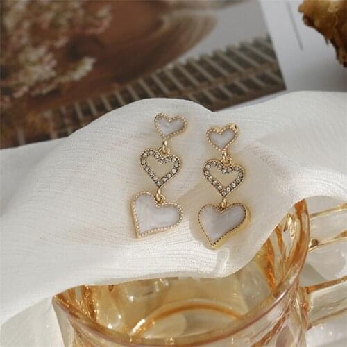 Hangzhi New Korean Temperament Simple Love Drop Glaze Earrings Hollow Heart Shaped Diamond Earrings