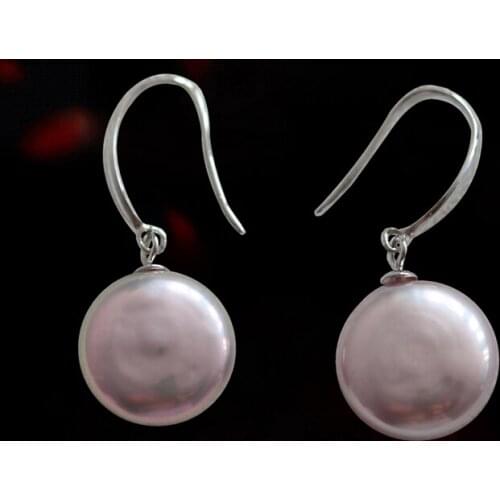 Baroque freshwater are button shaped natural pearl earrings