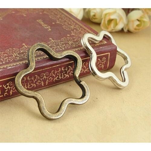 5pcs White K And Antique Bronze Plated Retro Plum Shaped Key Ring For Making DIY Jewelry