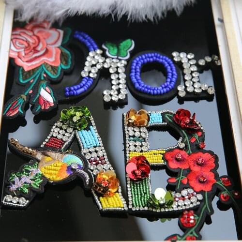 High quality Embroidery Bird letter rhinestone beaded patches for clothing Sew on sequins diy flower parches bordados para ropa