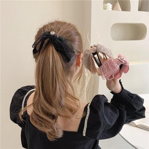 Koreas new college style sweet big bow hollow banana clip vertical clip ponytail clip hairpin hair accessories headdress