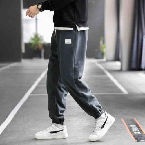 New Fashion Loose Sweatpants Men Elastic Waist Fleece Casual Harem Pants Male Patches Drawstring Jogging Sport Track Trousers