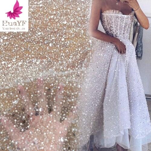 2020 Hot White Sequins Embroidery French Lace Fabric With Beads and pearls for bridal dress HY1334