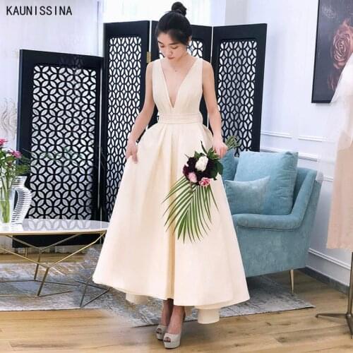 KAUNISSINA Champagne Wedding Gowns Deep V-Neck Backless Bow Sexy A-Line Wedding Dress For Brides Custom Size Bridal Vestidos