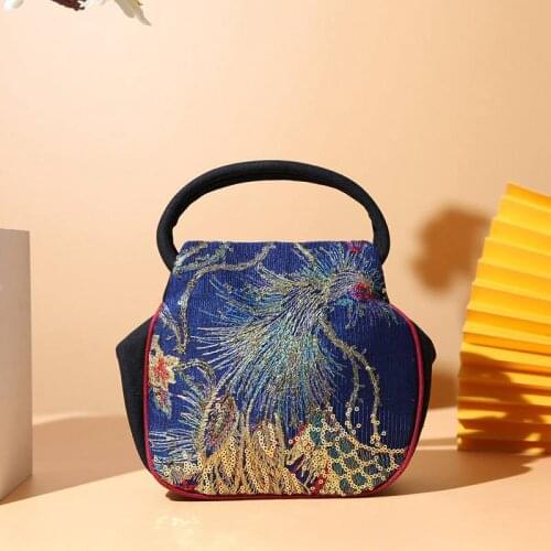 The new national wind yunnan phoenix sequins embroidery embroidered bag handbag hand bag