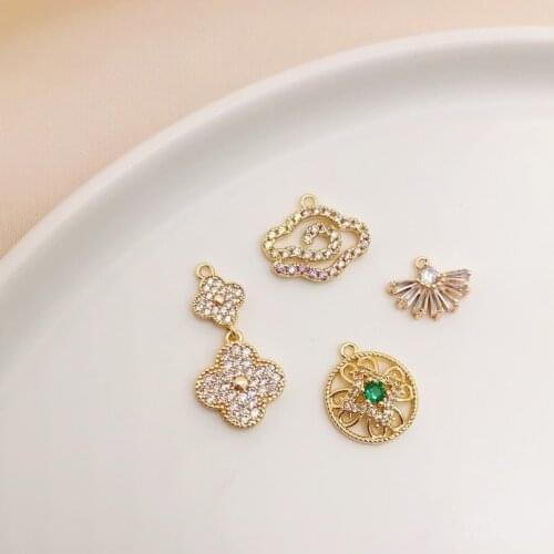 Gold-clad inlaid zircon light luxury light color auspicious clouds four-leaf clover fan-shaped pendant DIY jewelry material