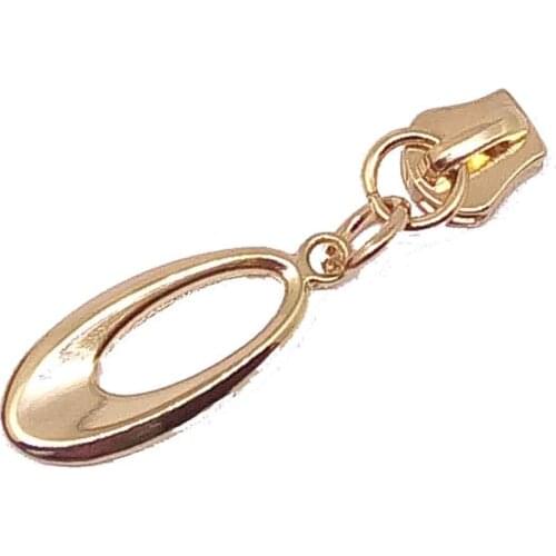 Gold zipper head
