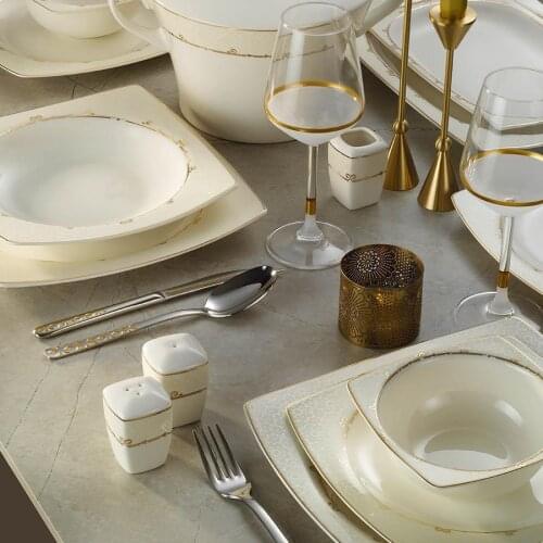 Kutahya has Porcelain Bone Mare 62 Piece 1137421 Pattern Dinner set