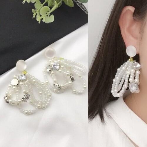 Woven earrings with all kinds of pearls, simple, fashionable, fashionable, personalized, European and American styles
