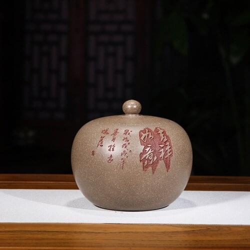 The new purple sand tea pot cylinder tea cake tea pot number five cake carved by hand draw luck on sale