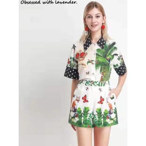 Obsessed with lavender.The new two-piece short sleeve shorts printed butterfly elephant pattern refreshing ladies summer green