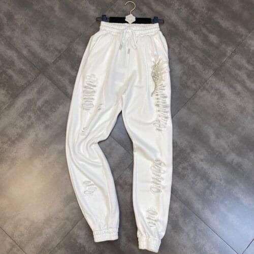 ZCSMLL Autumn Elastic Waist Pearl Chain Decoration Personality Hole Street Close Thin Casual Women Black Pants 2021 New Tide