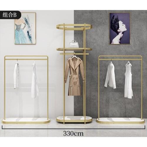 Simple clothing store showcase floor formula womens shelf network red Na rice gold iron hanger