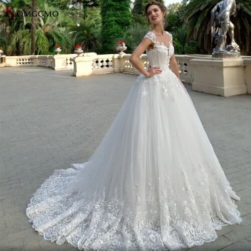 High-End Illusion O-Neck Court Train Cap Sleeve Bridal Ball Gown 2021 Hot Sale Embroidery Appliques Tulle Button Wedding Dress