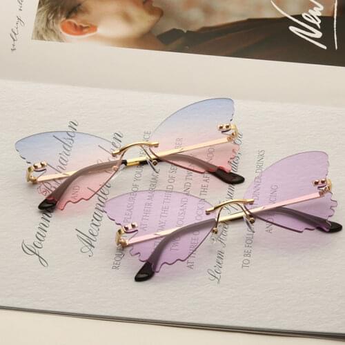 New Fashion Rimless Sunglasses Women Retro Transparent Ocean Lens Glasses Luxury Ladies Butterfly Design Sun Glasses UV400