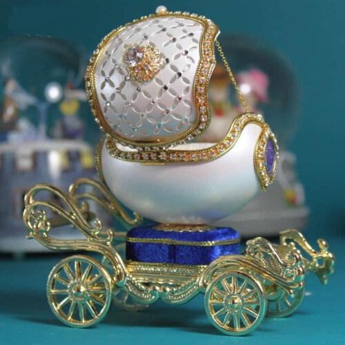 Exquisite egg carving modeling music box Beautiful golden jewelry storage box Christmas perfect gift