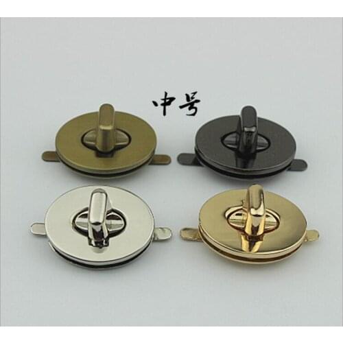 10 PCS / lot) luggage handbags high-grade oval-shaped twist lock hardware accessories