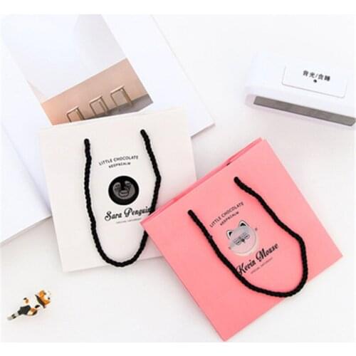 DL Korean modern wind hand-held gift bag lovely fashion cartoon small gift wrapping paper bag student supplies