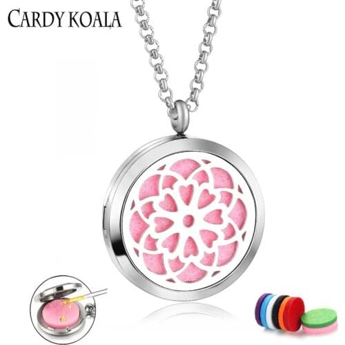 Beautiful stainless steel flower pattern perfume aromatherapy essential oil pendant necklace couple free shipping