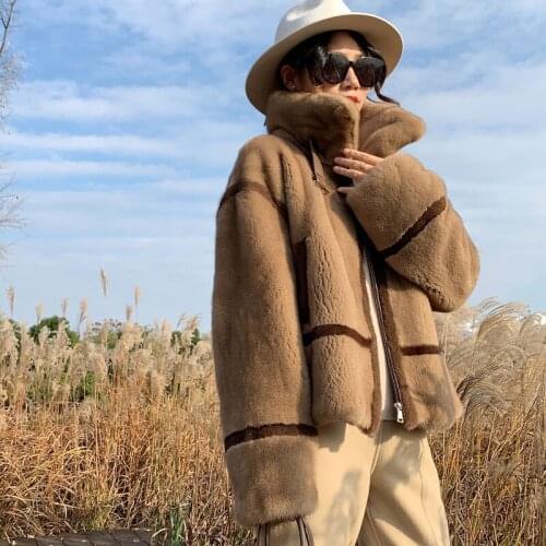 Flying lady 2021 new mink coat womens whole mink fur young fashion mink short locomotive coat net red