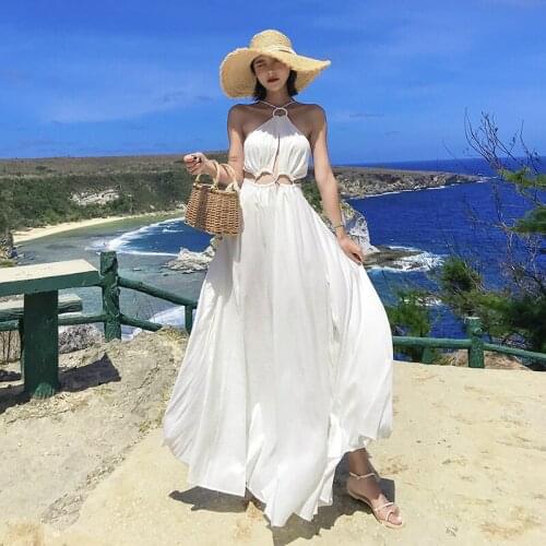 Summer beach skirt seaside vacation sexy temperament super romantic white mid-waist strap halter back pure color dress