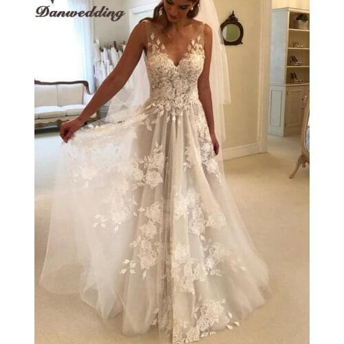 Sexy Backless A-Line Wedding Dresses Deep V-Neck Refinement Lace Applique Luxury Court Train Bridal Dress Sleeveless New Arrival