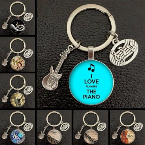 New Creative / Musical Instrument Clarinet Guitar Flute Violin Music Note Keychain Pendant Key Chain Music Glass Dome Crystal